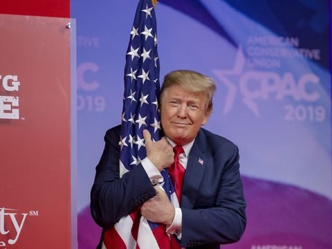 trump_hugs_flag